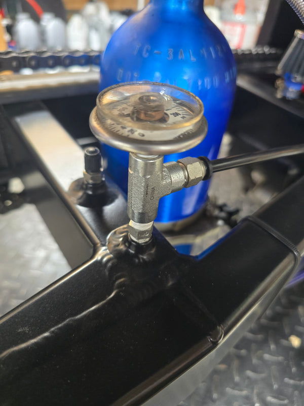 Air gauge swingarm assembly